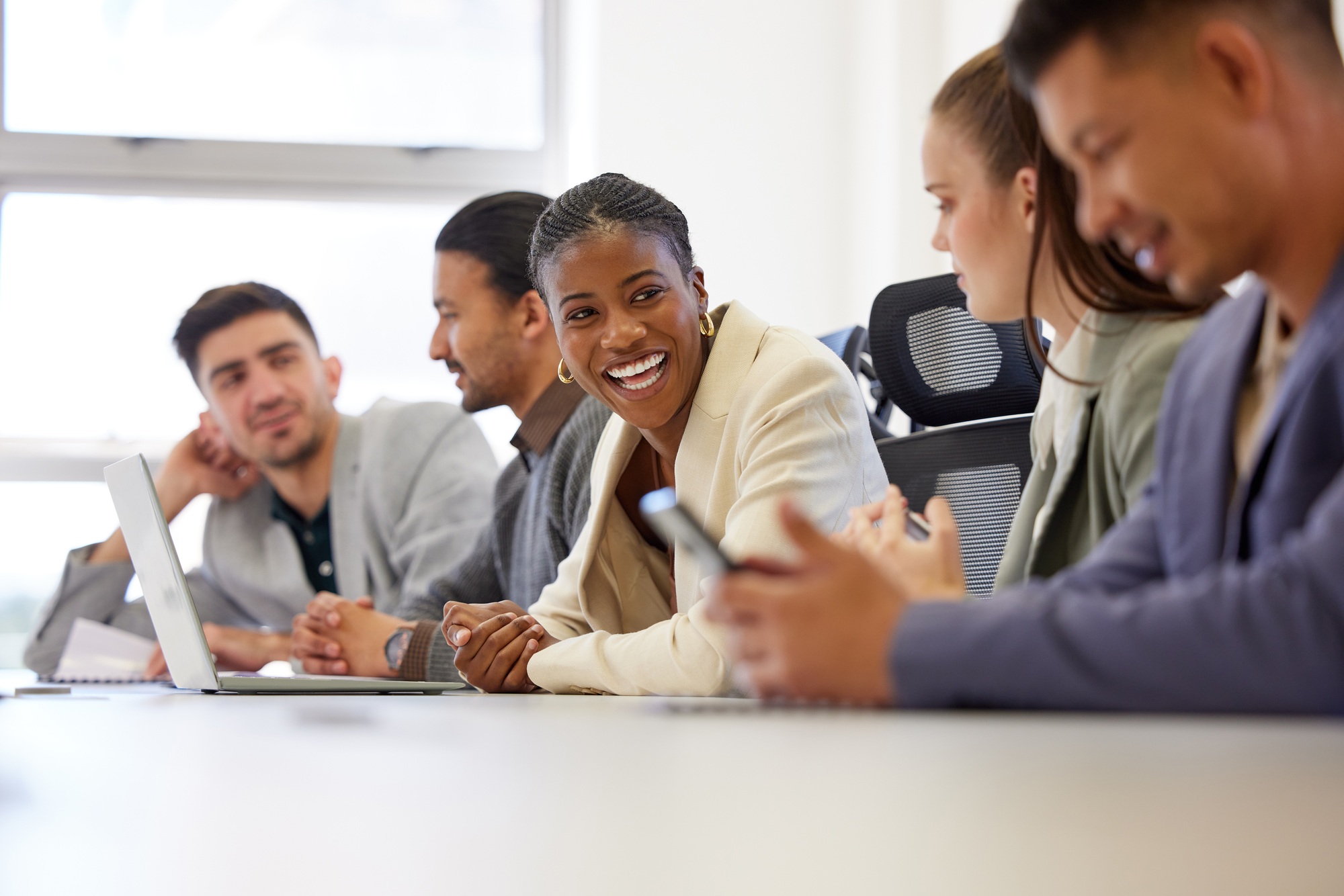 Shot of a group of businesspeople having a meeting in a boardroom at work